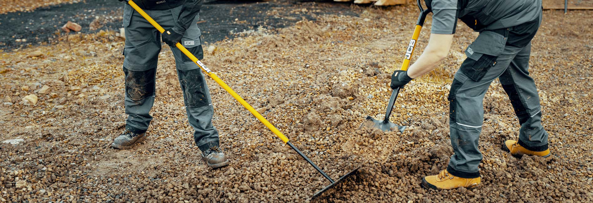 JCB Rake and shovel laying gravel